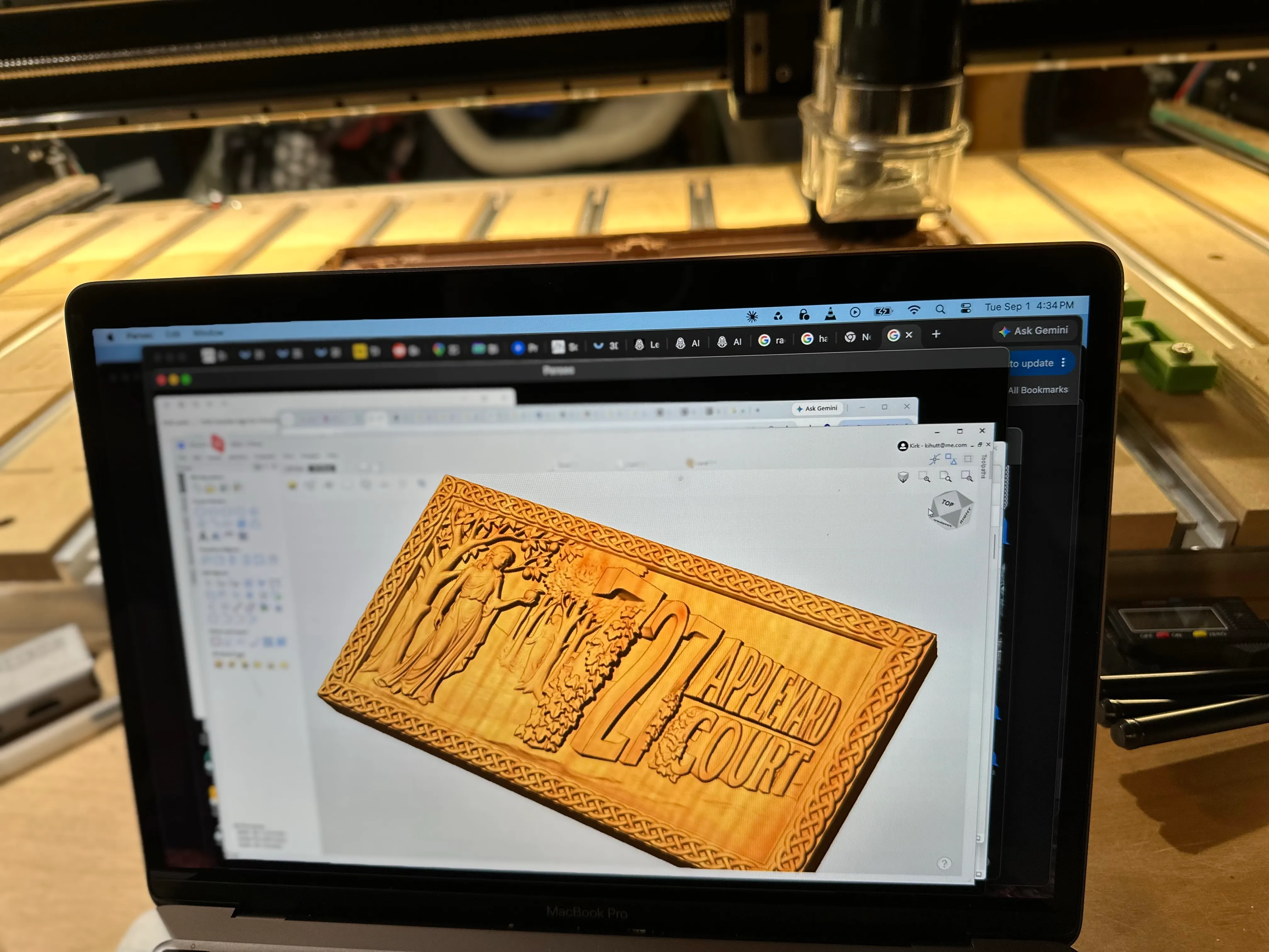 Design on screen, machine behind